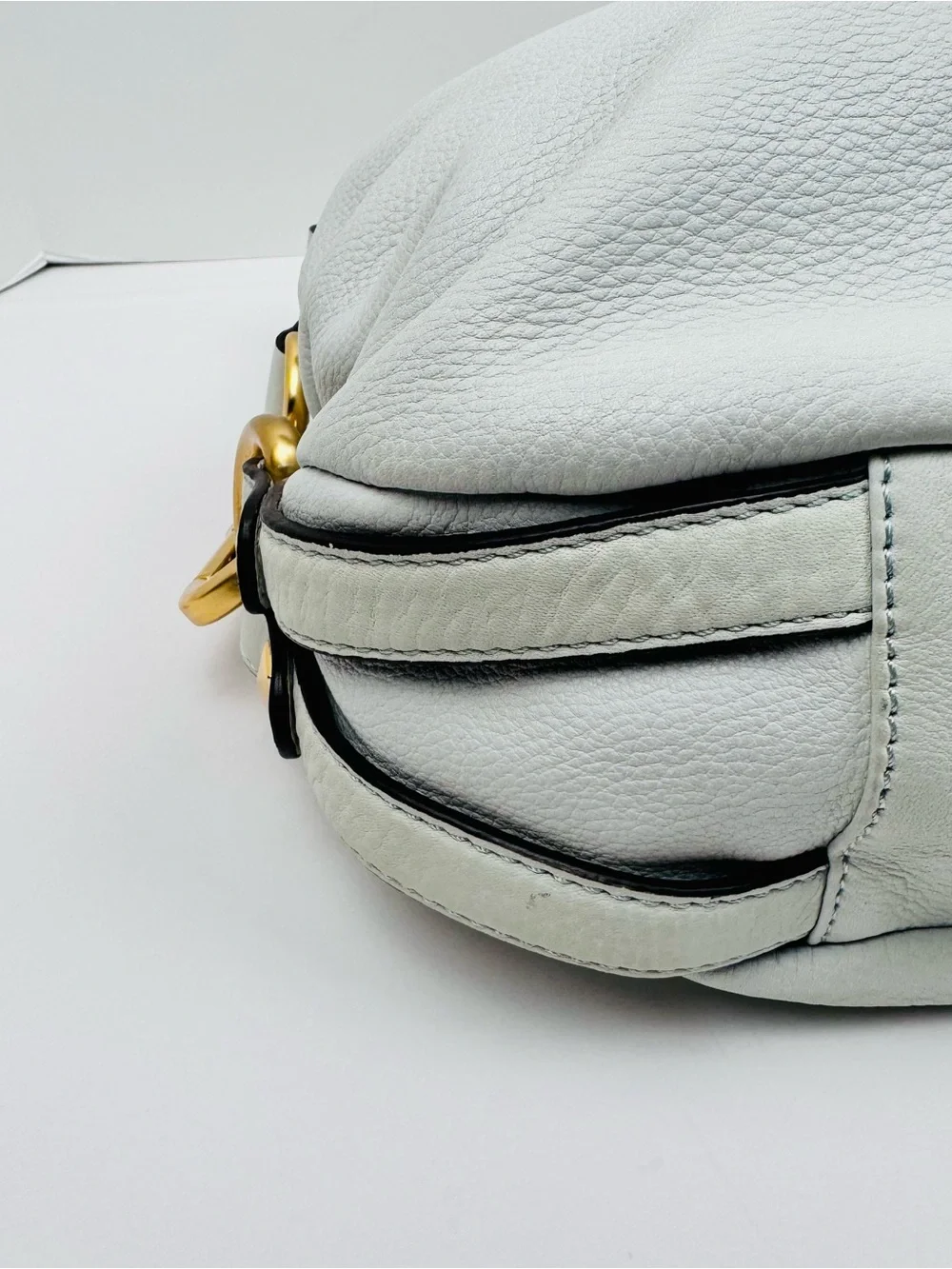 B. Makowsky Leather Ivory Hobo handbag. Gold-tone stud accent hardware.